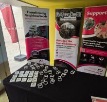 Banners and promotional stand marketing Proper Good an investment arm