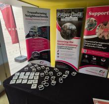 Promotional stands and giveaways for WLCC's Proper Good social investment scheme