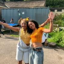 2 girls posing 