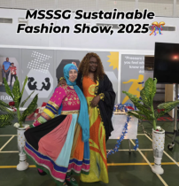 Two models pose together at the MSSSG Sustainable Fashion Show 2025 wearing vibrant, colourful garments inspired by diverse cultural traditions. The event celebrates sustainable fashion, inclusion, and cultural diversity through creative textile and clothing design.