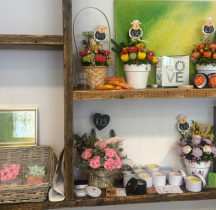 Picture of crocheted flowers being sold with price tags ranging from £25-35